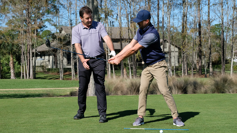 Two golfers demonstrating tempo