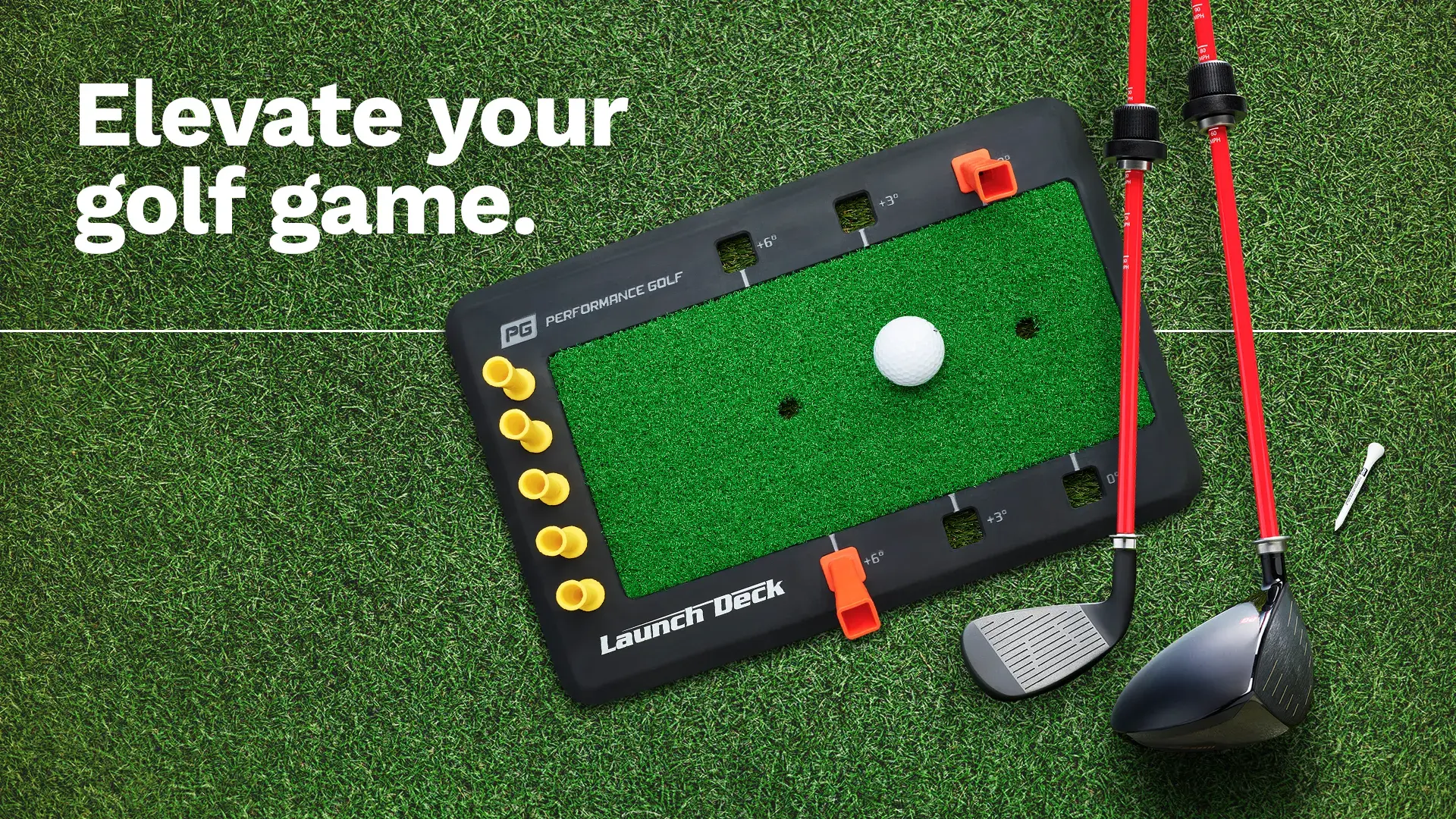 The Performance Golf training aid The Launch Deck, Click Stick and a white tee on the grass.