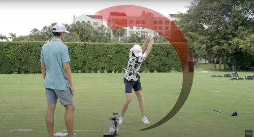 Performance Golf coaches working on a ball speed drill on the golf course, showing an emphasis on the golf swing.