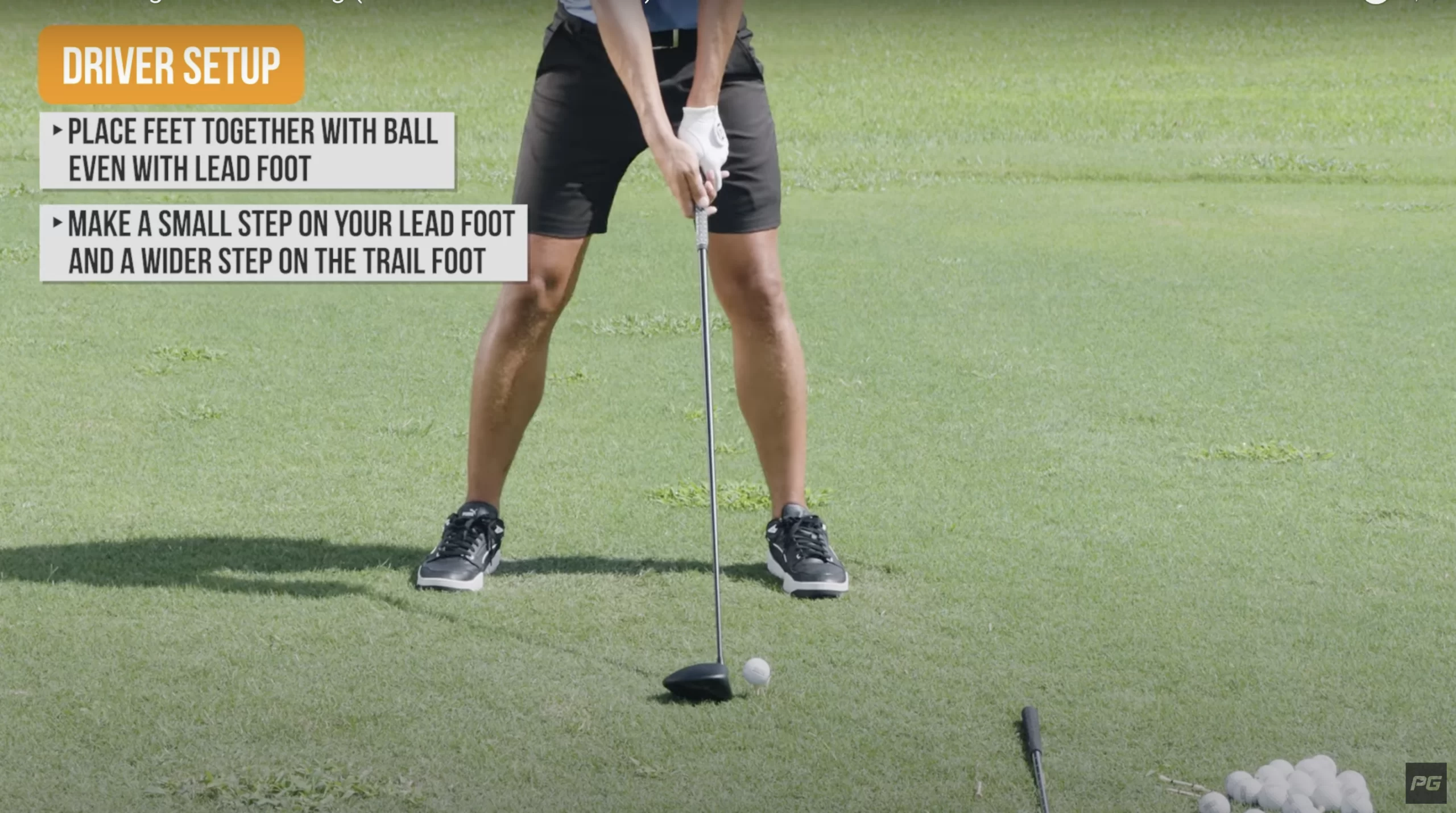 JT Thomas in a Performance Golf YouTube video showcasing a close up of the proper driver setup, including the proper alignment of the golf ball and feet.