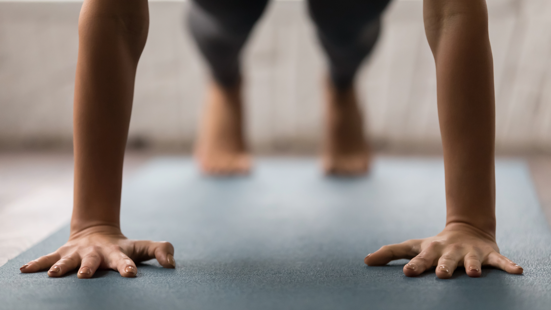 Close up of a woman doing a plank exercise working on core strength.