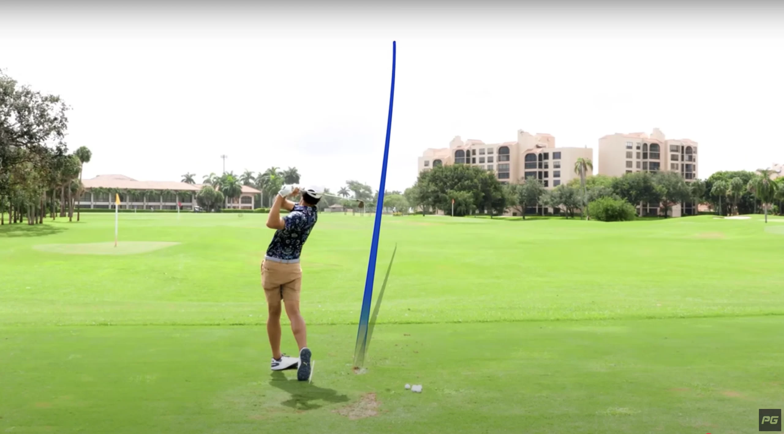 Performance Golf coach JT Thomas hitting a straight drive with accurate contact on the golf course.