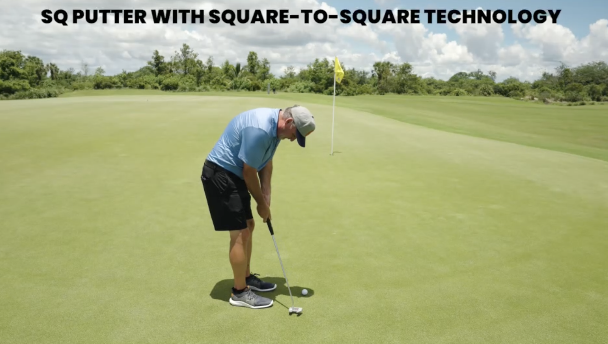 A golfer on the golf course using the Performance Golf SQ Putter.